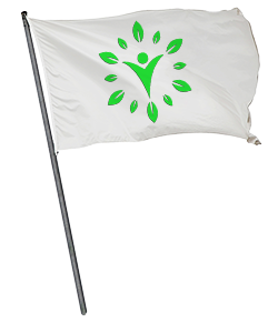 A white pillow with green leaf design on it.