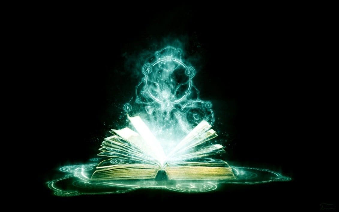 Glowing magical book with mystical aura.