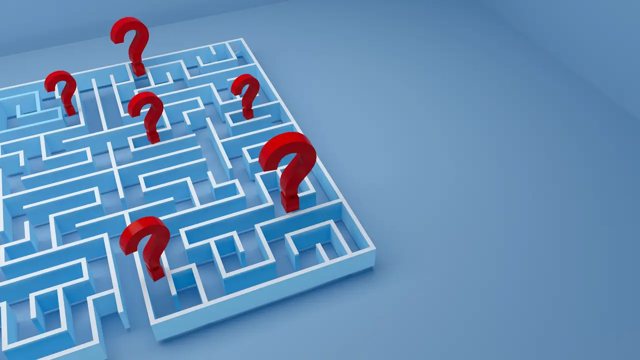 Maze with red question marks throughout.